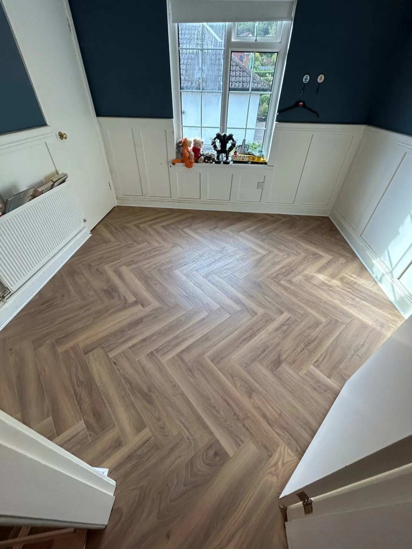 Stylish modern kitchen with durable laminate flooring finish