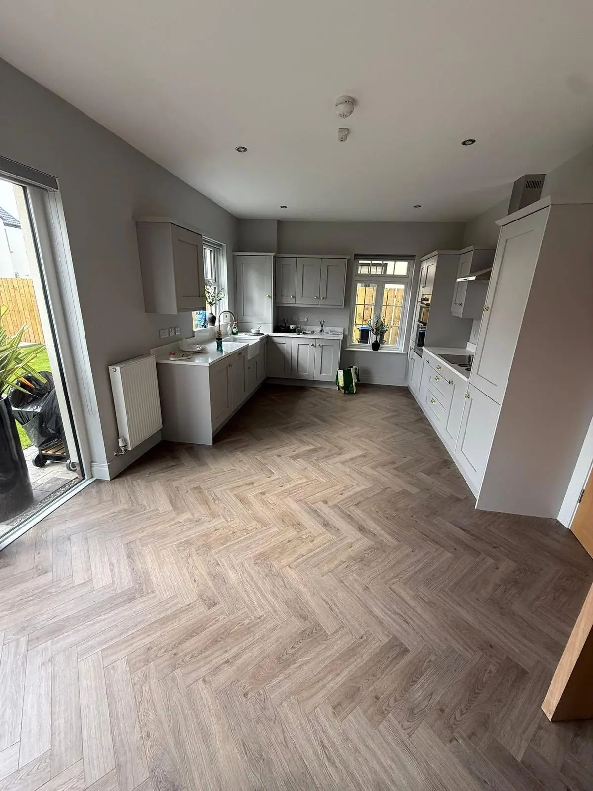 Close-up of modern laminate flooring installation in Northern Ireland home
