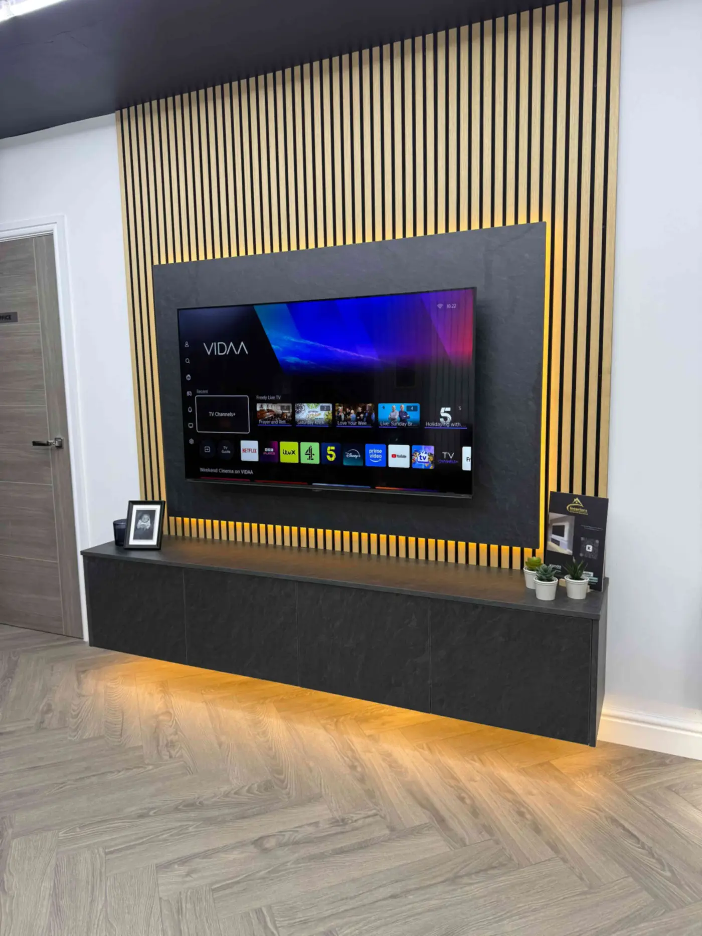 Interior showroom in Bangor featuring modern wall panelling and feature walls